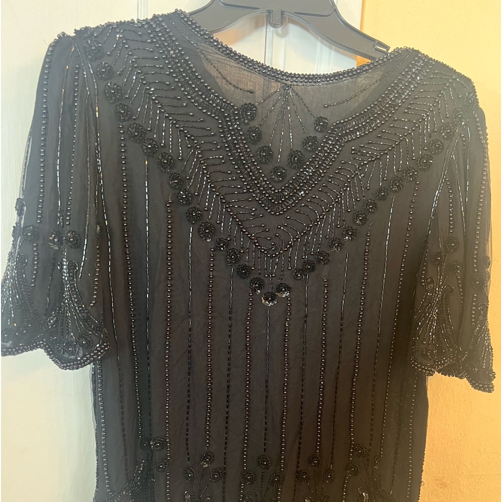 Sequins and beaded blouse.  Very well made size PM. Black